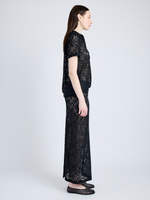 Proenza Schouler Side full length image of model wearing Jasmine Skirt in Stretch Lace in BLACK