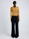 Proenza Schouler Back full length image of model wearing Norah Top in Silk Viscose Knit in DARK CAMEL