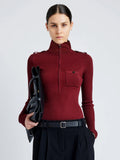 Proenza Schouler Front cropped image of model wearing Norah Top in Silk Viscose Knit in DARK RED