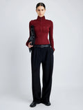 Proenza Schouler Front full length image of model wearing Norah Top in Silk Viscose Knit in DARK RED