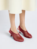 Front cropped image of model wearing Tee Perforated Slingback Pumps in RED