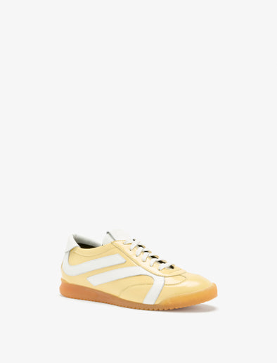 Proenza Schouler front 3/4 image of Track Sneakers in Slick Nappa in resin/ecru