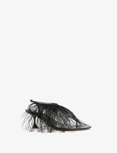 Proenza Schouler Front 3/4 image of Tee Thong Feather Sandals in Slick Nappa in black