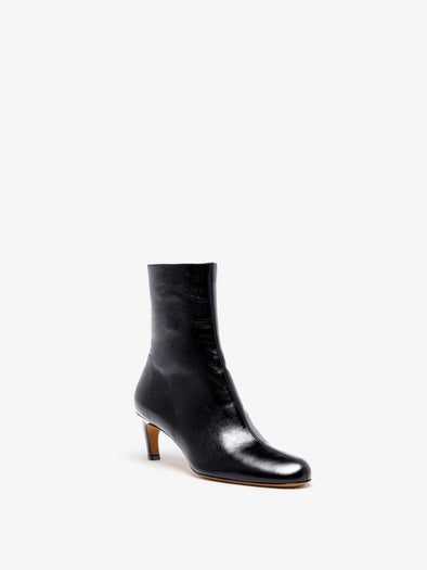 Proenza Schouler Front 3/4 image of Uma Ankle Boots in Slick Calf in Black