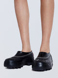 Proenza Schouler image of model wearing SOREL x Proenza Schouler CARIBOU Mule WP in BLACK/CHALK