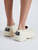 Proenza Schouler image of model wearing SOREL x Proenza Schouler CARIBOU Mule WP in CHALK/BLACK