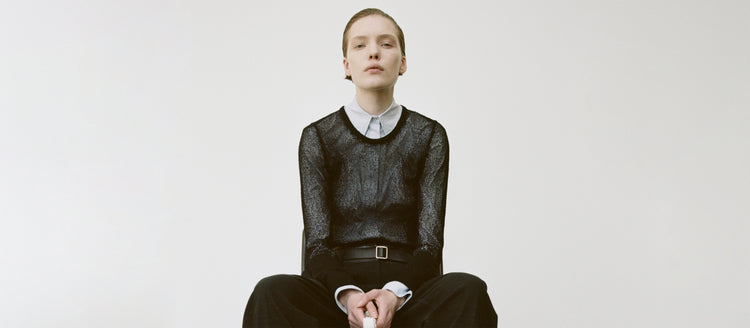 Image of a model wearing Allen Shirt in Crinkled Cotton Gabardine in sky blue and Willa Sweater in Sheer Mesh in black