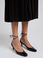 Proenza Schouler Image of model wearing Uma Tie Pumps in Slick Calf in Black