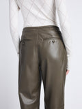 Detail image of model wearing Faux Leather Straight Leg Pants in wood