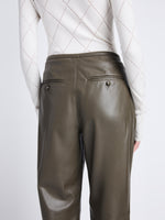 Detail image of model wearing Faux Leather Straight Leg Pants in wood