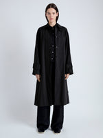 Front image of model wearing Clark Trench Coat in Cotton Nylon in BLACK