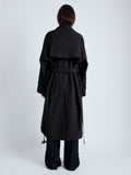 Back image of model wearing Clark Trench Coat in Cotton Nylon in BLACK