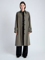 Front image of model wearing Clark Trench Coat in Cotton Nylon in khaki