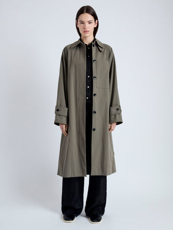 Front image of model wearing Clark Trench Coat in Cotton Nylon in khaki