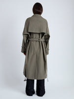 Back image of model wearing Clark Trench Coat in Cotton Nylon in khaki