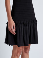 Detail image of model wearing Martine Dress in Micro Pleat in BLACK