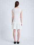 Back full length image of model wearing Martine Dress in Micro Pleat in OFF WHITE