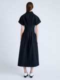 Back full length image of model wearing Balston Dress in Poplin in BLACK