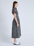 Side image of model wearing Balston Dress in Grid Poplin in CREAM/BLACK