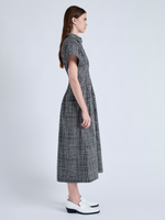 Side image of model wearing Balston Dress in Grid Poplin in CREAM/BLACK