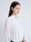 Detail image of model wearing Carter Top in Tech Poplin in WHITE