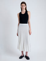 Front image of model wearing Pleated Miles Skirt in Crepe in WHITE/BLACK