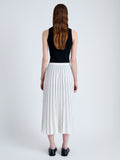 Back image of model wearing Pleated Miles Skirt in Crepe in WHITE/BLACK