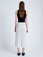 Back image of model wearing Pleated Miles Skirt in Crepe in WHITE/BLACK