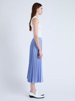 Side image of model wearing Pleated Miles Skirt in Crepe in PALE IRIS/BLACK