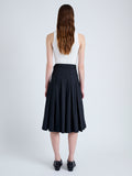 Back full length image of model wearing Peters Skirt in Tech Poplin in BLACK