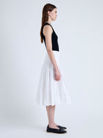 Side full length image of model wearing Peters Skirt in Tech Poplin in WHITE