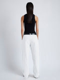 Back image of model wearing Sydnor Pants in Rumpled Cotton in white