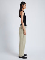 Side image of model wearing Sydnor Pants in Rumpled Cotton in khaki