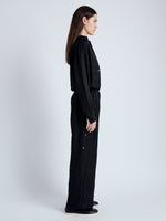 Side full length image of model wearing Anders Pant in Crinkled Flou in BLACK