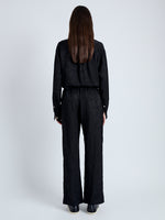 Back full length image of model wearing Anders Pant in Crinkled Flou in BLACK