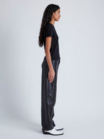 Side image of model wearing Smyth Pant in Leather in BLACK