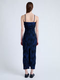 Back full length image of model wearing Ward Knit Dress in Printed Rib in NAVY/BLACK