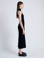 Side full length image of model wearing Kim Knit Dress in Compact Pointelle Rib in BLACK