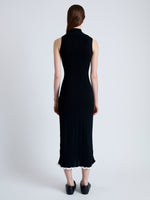 Back full length image of model wearing Kim Knit Dress in Compact Pointelle Rib in BLACK