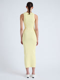 Back full length image of model wearing Cole Knit Dress in Viscose Rib in PALE YELLOW