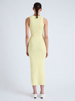 Back full length image of model wearing Cole Knit Dress in Viscose Rib in PALE YELLOW