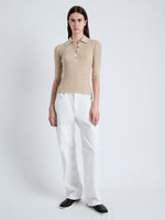 Front full length image of model wearing Cooper Knit Polo in Micro Cable in CASHEW