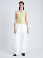 Front image of model wearing Perry Knit Top in Compact Pointelle Rib in pale yellow