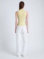 Back image of model wearing Perry Knit Top in Compact Pointelle Rib in pale yellow