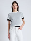 Front cropped image of model wearing Powell Sheer Knit Top in OFF WHITE/BLACK