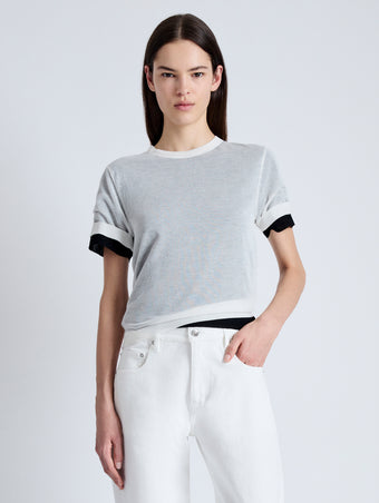 Front cropped image of model wearing Powell Sheer Knit Top in OFF WHITE/BLACK