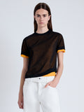 Front cropped image of model wearing Powell Sheer Knit Top in BLACK/MARIGOLD