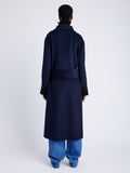 Proenza Schouler Back full length image of model wearing Constance Coat in Pinstripe Wool Cashmere in NAVY MELANGE