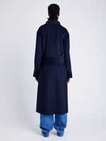 Proenza Schouler Back full length image of model wearing Constance Coat in Pinstripe Wool Cashmere in NAVY MELANGE