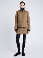 Proenza Schouler Front full length image of model wearing Sawyer Jacket in Gabardine in DARK BIRCH buttoned up